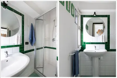 a bathroom with a sink and a shower at Iconic Apartment in Porta Carini by Wonderful Italy in Palermo