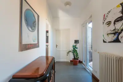 a living room with a bench and a window at A Casa Dell' Artista in Palermo