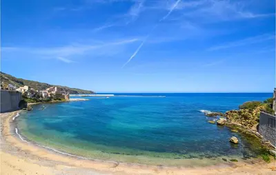 a view of a beach with blue water at 2 Bedroom Amazing Apartment In Trappeto in Trappeto