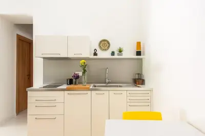 a bathroom with a shower and a sink and a toilet at Vucciria Apartments by Wonderful Italy in Palermo