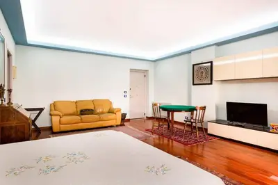 a living room with a couch and a table at Palermo old style - Boutique apartment with terrace in center city in Palermo