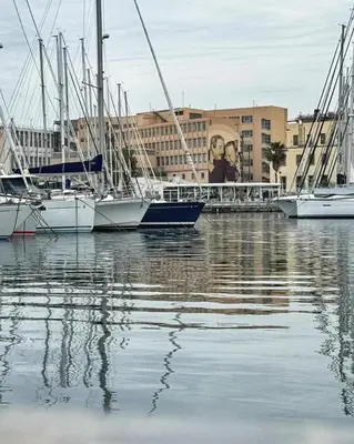 a group of boats are docked in a marina at LE CAMERE AL CASSARO in Palermo