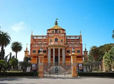 a building with a gate in front of it at AR Palace Hotel - Palermo in Isola delle Femmine