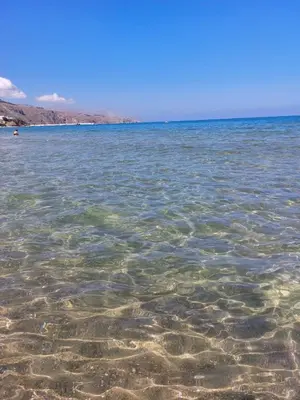 a body of water with rocks in the water at CASA DEL SOLE in Alcamo