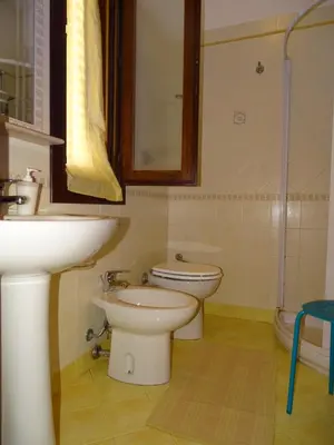 a bathroom with a sink and a toilet and a shower at CASE COLOMBO E MATTARELLA by Trerose Properties - Appartamenti centrali con wi-fi e posto auto privato gratuito in San Vito lo Capo