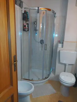a bathroom with a shower and a toilet at CASA MIKY in Palermo