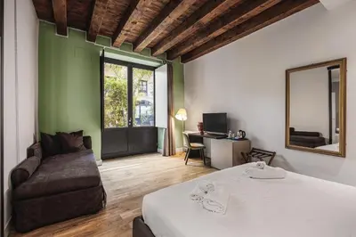 a bathroom with a shower and a sink and a toilet at PALAZZO SANTAMARINA Luxury Suite & Spa in Palermo