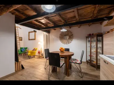 a kitchen and dining room with a table and chairs at CityCenter Unique Apartment-Sleeps 2- Pet Friendly in Palermo