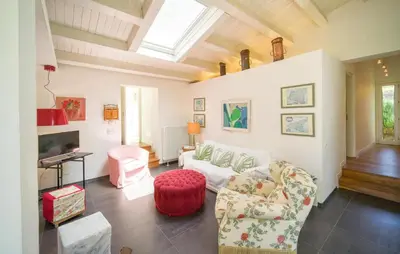a living room with a couch and a table at Nocellara in Alia