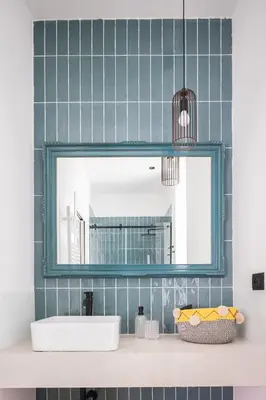 a bathroom with a mirror and a sink at Vossia Luxury Rooms & Sicilian Living in Palermo