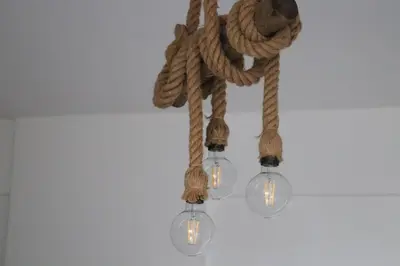 a cluster of three light bulbs with rope and lights at Casa de Paoli - Vista Mare Arenella, Palermo con Parcheggio Privato in Palermo
