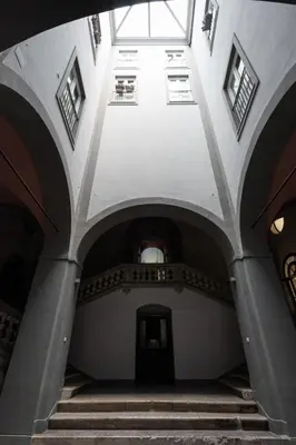 an empty hallway with stairs in a building at Carlo Suite Apartments con Vasca Idromassaggio in Palermo