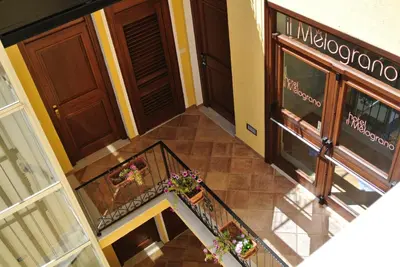 an overhead view of a staircase in a building at Hotel Il Melograno in San Vito lo Capo
