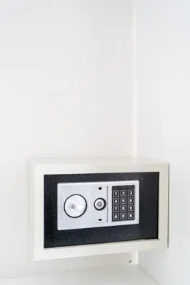 a microwave oven on a white wall at Marmur Suite in Palermo