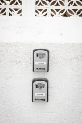 a wall with two knobs on it at Cube 67 - Villa in Palermo