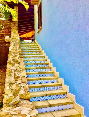 a set of stairs leading to a house at Villa Dorotea con piscina in Trappeto