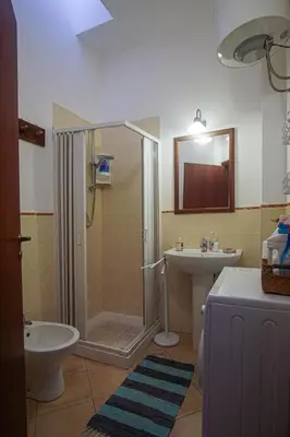 a bathroom with a shower and a sink at Màkari in Macari
