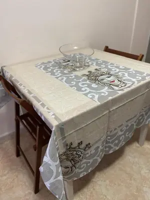 a table with a table cloth on top of it at Casa vacanza Giusi in Palermo