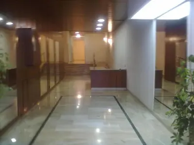 a hallway of a building with a podium in it at Dal Porto al Politeama in Palermo