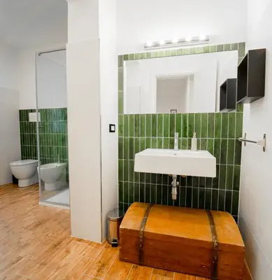 a bathroom with a sink and a mirror at Civico64 apartments in Castellammare del Golfo