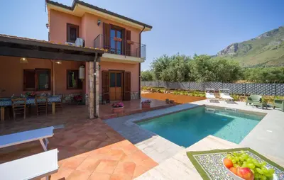 a villa with a swimming pool and a house at Beautiful Home In Torre Colonna-Sperone in Mandra Capreria