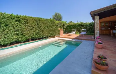 a swimming pool in front of a house at Beautiful Home In Torre Colonna-Sperone in Mandra Capreria