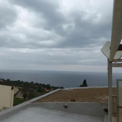 a view of the ocean from the roof of a house at La casetta a Scopello in Scopello
