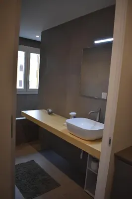 a bathroom with a sink and a mirror at GiaChi friendly studios a Ballarò in Palermo