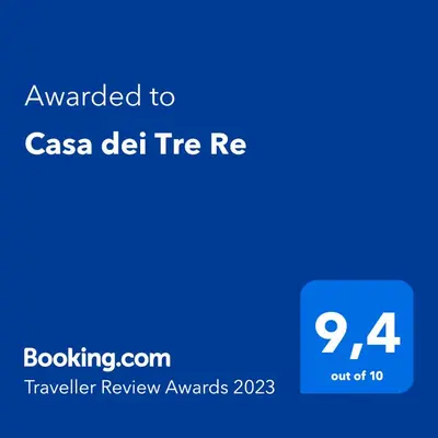 a blue text box with the words awarded to csa del tiered tiered at Casa dei Tre Re in Palermo
