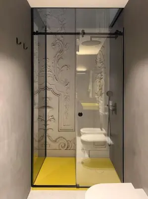 a bathroom with a glass shower with a toilet at The347, Diletta in Palermo