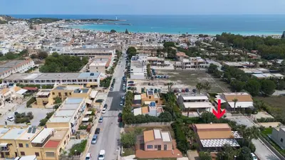 an aerial view of a town with the ocean at Villa Morici con ampio giardino in San Vito lo Capo