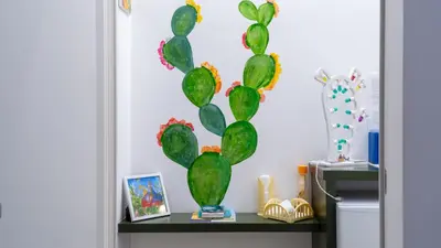 a painting of a cactus on a wall at Casa Paradiso in Castronuovo di Sicilia
