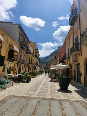 an empty street in a town with buildings at La Casetta di Giò! in Castellammare del Golfo