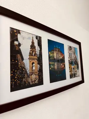 a framed picture of cities on a wall at LA CASA DI TABBi in Palermo