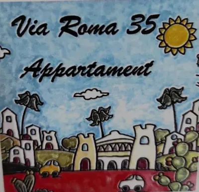 a sign with a drawing of a city at Via Roma 35 Apartament in Monreale