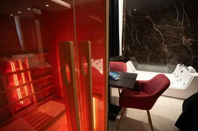a bed with two towels on top of it at Nuar suite&spa in Palermo
