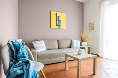 a bedroom with a bed and a window at Sedie Volanti Apartment with Jacuzzi in Palermo