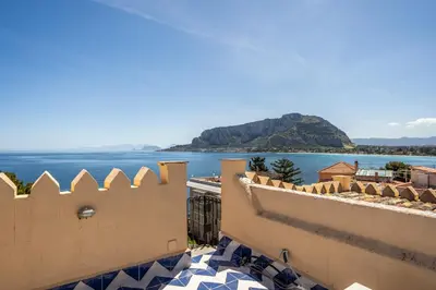 a view of the ocean from a building at I Merli sull'acqua - Suite in Palermo