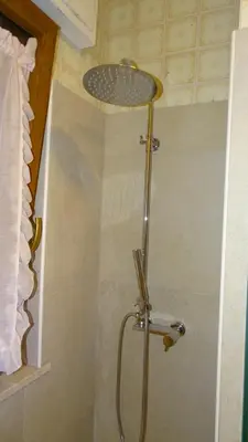 a shower with a shower head in a bathroom at Il Gabbiano al Capo in Palermo