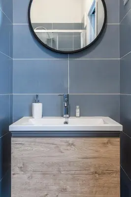 a bathroom with a sink and a mirror at Le Cinque Stanze Palermo Room&Breakfast in Palermo
