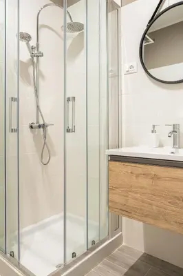 a bathroom with a shower and a sink at Le Cinque Stanze Palermo Room&Breakfast in Palermo