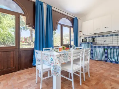 a kitchen and dining room with a table and chairs at Holiday Home Alice by Interhome in Ficarazzi