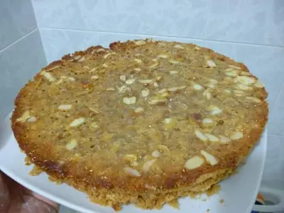a close up of a pie on a white plate at B&B Poliglotta in Castelluzzo