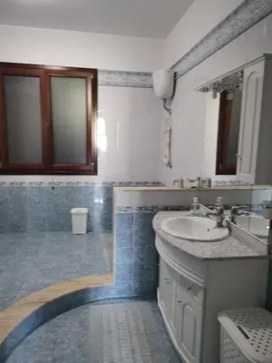 a bathroom with a sink and a mirror at B&B La Fenice in Termini Imerese