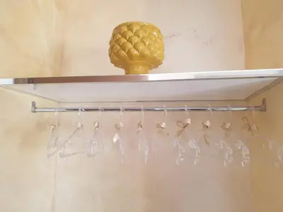 a towel rack with a bunch of tooth picks at Makari mare in Macari