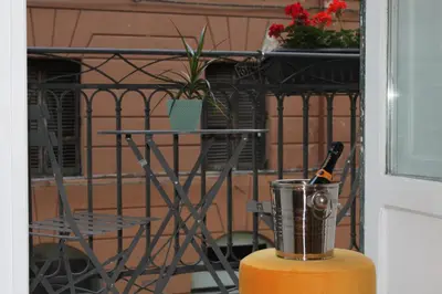 a blender sitting on top of a table with a plant at Sole Apartment in Palermo