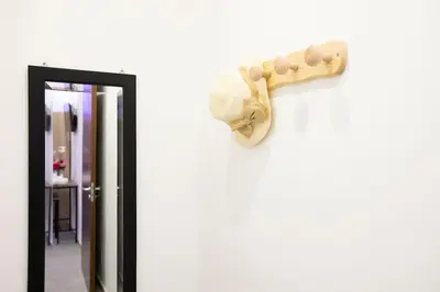 a bone hanging on a wall next to a door at La Domus di Segesta 
