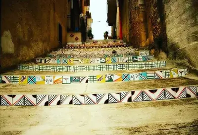 a group of stairs with colorful tiles on them at La Domus di Segesta 