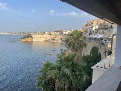 a view of a body of water from a building at Castello a Mare in Castellammare del Golfo