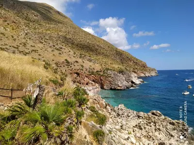 a view of the ocean from a rocky mountain at CasaAntonietta in Alcamo